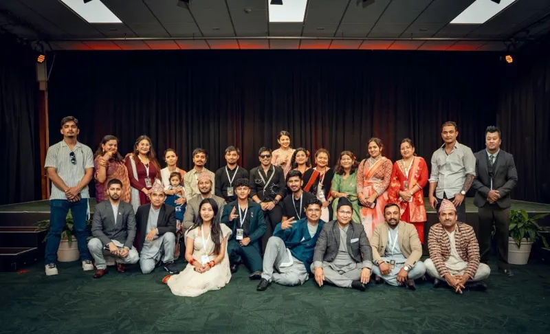The Aakhi Jhyal Events team with Prakash Saput on stage after the Nepali New Year 2083 show